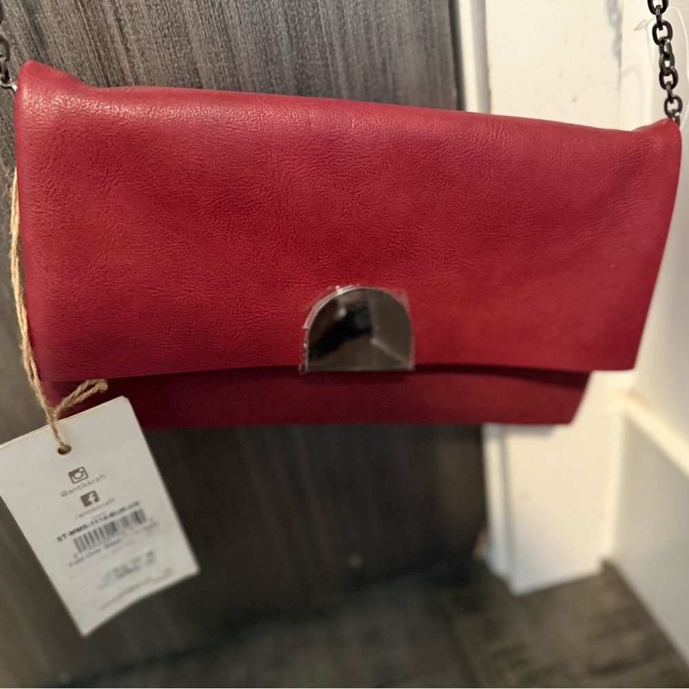Antik Kraft red leather purse with metal closure and silver chain